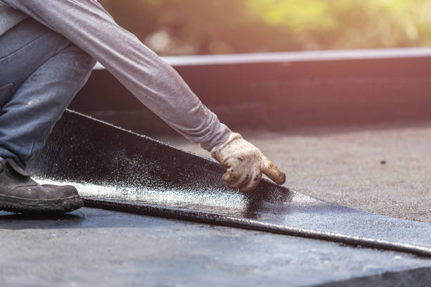 Professional Basement Waterproofing technician working in Greenwich, KS